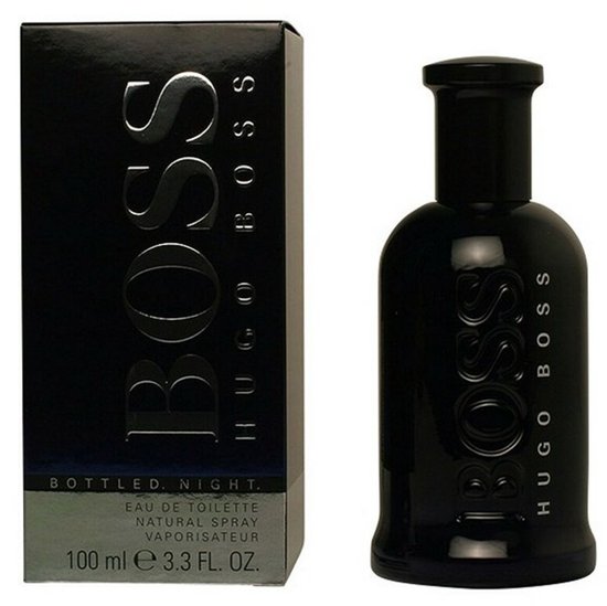 Zwarte Hugo Boss Bottled Night eau de toilette fles van 100ml en doos met zilveren opdruk 'BOSS HUGO BOSS'.