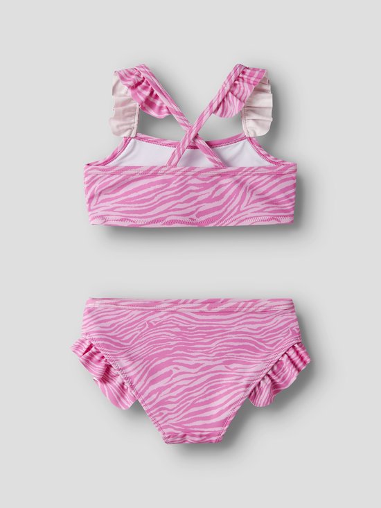 Roze bikini met witte zebraprint, ruches en gekruiste bandjes.