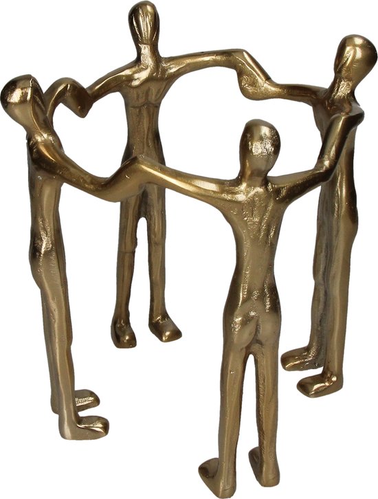 Petite statue dorée de quatre silhouettes humaines abstraites se tenant la main en cercle.