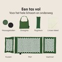 Geleverde items van de groene spijkermat set: massageballen, draagtas, rugsteun, linnen kleed, kussens, mat en voetmat.