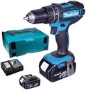 Makita slagboormachine met koffer, lader en twee 18V accu's.