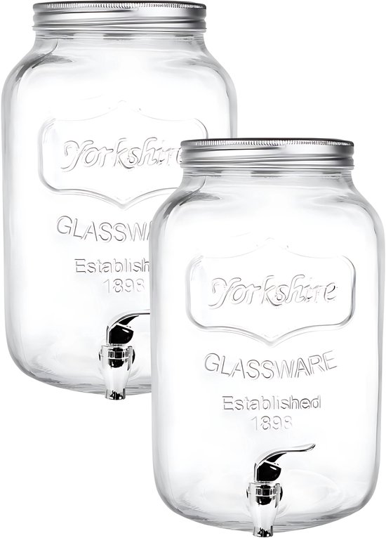 Deux distributeurs de boissons en verre avec robinet argenté, inscription Yorkshire, sur fond blanc.