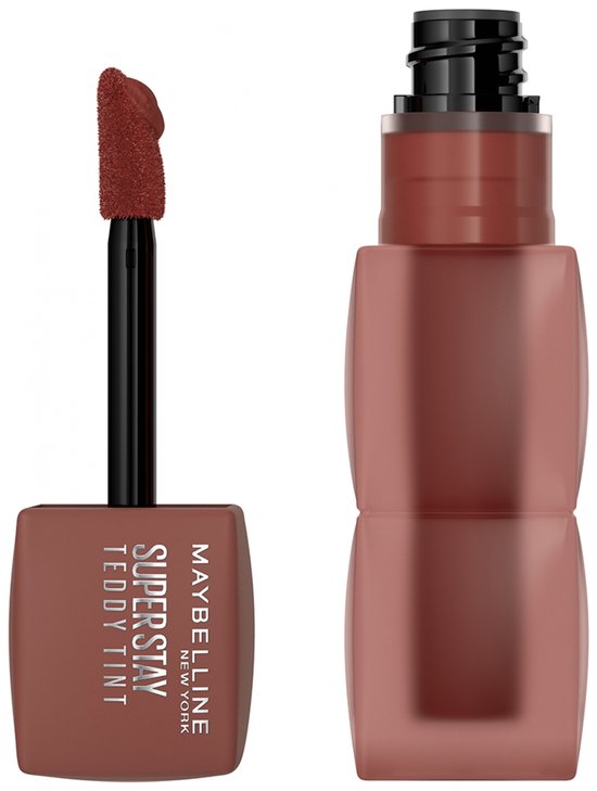 Bruin getinte lippenstift met applicator in de dop.