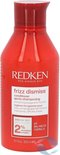 Redken Frizz Dismiss après-shampoing, 10,1 fl oz 300 ml, dans une bouteille rouge.