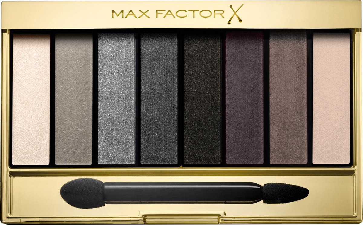 Max Factor oogschaduwpalette met acht grijstinten en applicator in gouden verpakking.