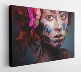 Young woman with glamorous bizarre face art red curly hair with clips and glowing brown eyes on dark blue background in studio - Modern Art Canvas - Horizontal - 293064002 - 80*60