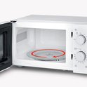 Open witte Severin magnetron met draaiplateau en rode draairichtingpijl.