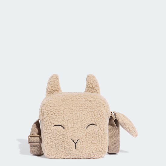 Beige teddy tasje in de vorm van een schaapje, de voorkant is zichtbaar.