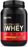 Zwarte pot met Optimum Nutrition Gold Standard 100% Whey, "Chocolate Peanut Butter" smaak, 2 Lb (28 servings).