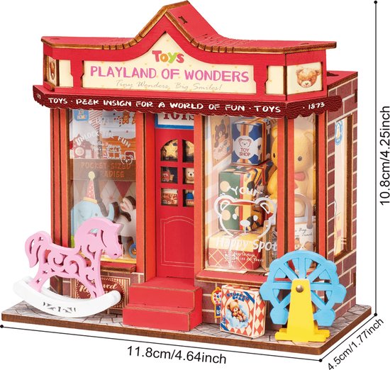 Miniatuur speelgoedwinkel 'Playland of Wonders' met roze wip, blauwe olifant, konijn, teddybeer en reuzenrad. Afmetingen getoond.