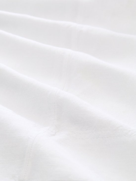 Textuur van witte stof met plooien