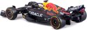 Zijaanzicht Red Bull Racing RB18 Formule 1 auto, donkerblauw met rode stier en gele accenten.