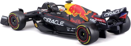 Zijaanzicht Red Bull Racing RB18 Formule 1 auto, donkerblauw met rode stier en gele accenten.