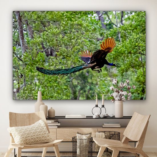Paon coloré vole à travers les bois Toile 180x120 cm - Tirage photo sur toile (Décoration murale salon / chambre) XXL / Groot format!