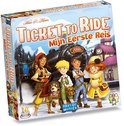 Doosspel Ticket to Ride: Mijn Eerste Reis met vier kinderen, een hond en een trein. Berglandschap op de achtergrond.