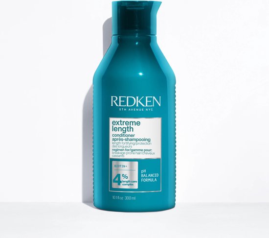 Redken Extreme Length conditioner, aquafl fles met 4% Biotin Length Care Complex.