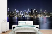 Behang - Fotobehang New York - Licht - Skyline - Breedte 600 cm x hoogte 400 cm