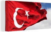 Canvas Schilderij Een Turkse vlag in de wind - 40x20 cm - Wanddecoratie