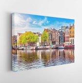 Canvas schilderij - Amsterdam Netherlands dancing houses over river Amstel landmark in old european city spring landscape. - 650339692 - 50*40 Horizontal