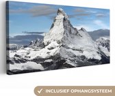 Canvas Schilderij Wolken boven de Matterhorn in Zwitserland - 80x40 cm - Wanddecoratie