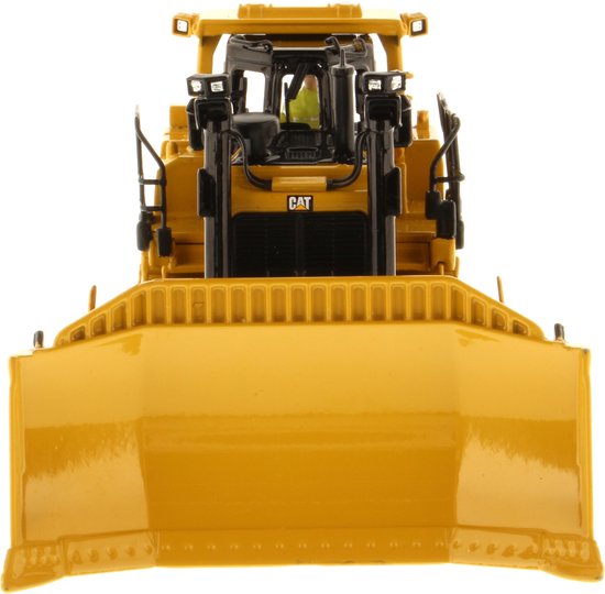 Vooraanzicht van gele CAT D9T bulldozer met schuifblad, getoond op witte achtergrond.