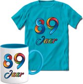 89 Jaar Vrolijke Verjaadag T-shirt met mok giftset Blauw | Verjaardag cadeau pakket set | Grappig feest shirt Heren – Dames – Unisex kleding | Koffie en thee mok | Maat XL