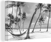 Canvas Schilderij Uitsnede hangmat op strand in Dominicaanse Republiek - 60x40 cm - Wanddecoratie