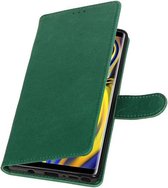 Wicked Narwal | Premium bookstyle / book case/ wallet case voor Samsung Samsung Galaxy Note 9 Groen