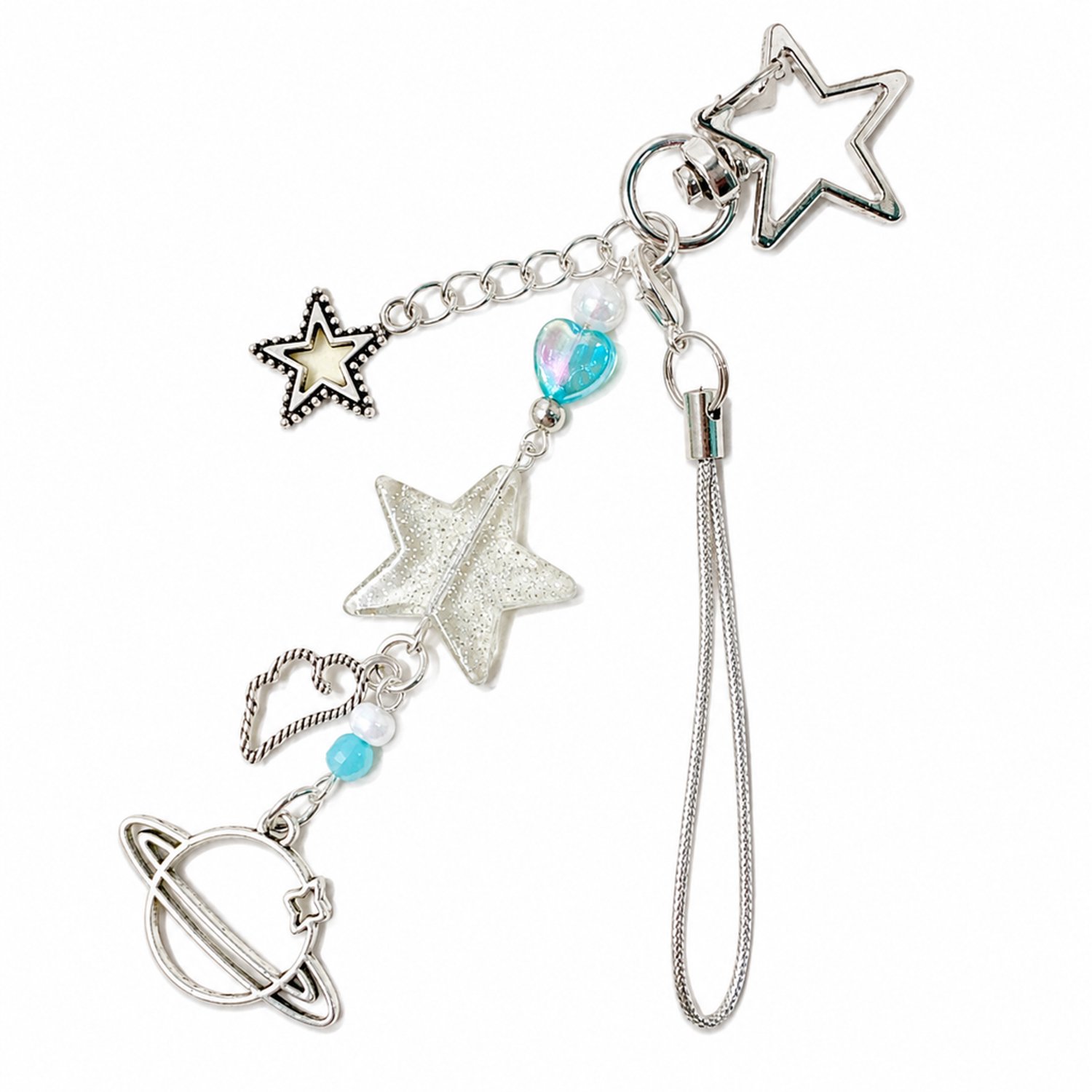 Sleutelhanger en tashanger met glitterster en planeet, stervormige sluiting en blauwe hartkraal