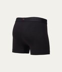 Zwarte boxershort, achterkant met subtiel oranje 'um'-logo op de tailleband.
