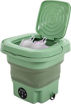 Lichtgroene opvouwbare mini wasmachine met een deksel open, waarin grijs en paars ondergoed ligt.