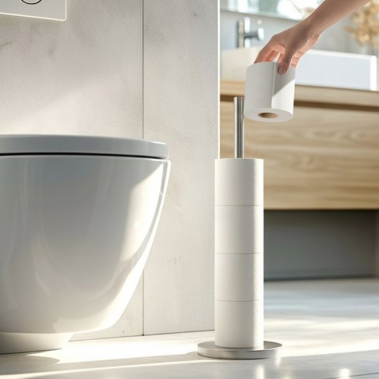 Zilverkleurige toiletrolhouder naast een toilet, met ruimte voor vijf rollen.