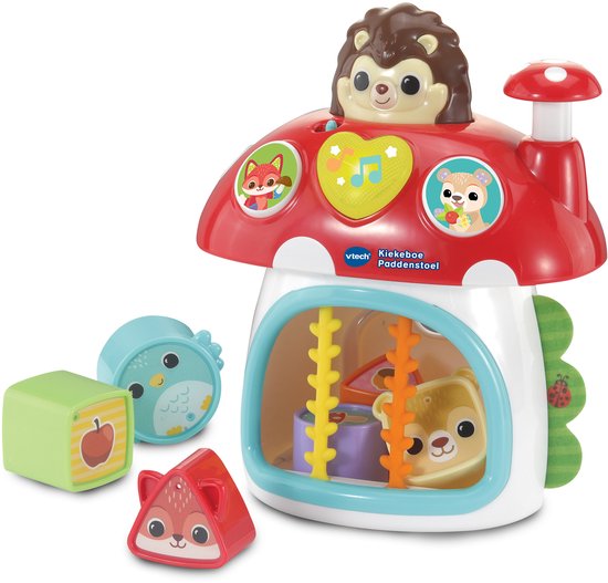 Een VTech kiekeboe paddenstoel speelgoed met 3D vormen waaronder een eekhoorn, uil en appel. Met een egeltje bovenop.