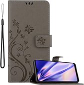 Cadorabo Hoesje voor Samsung Galaxy A21 in BLOEMEN GRIJS - Beschermhoes in bloemmotief met magnetische sluiting, standfunctie en kaartsleuven Book Case Cover Etui