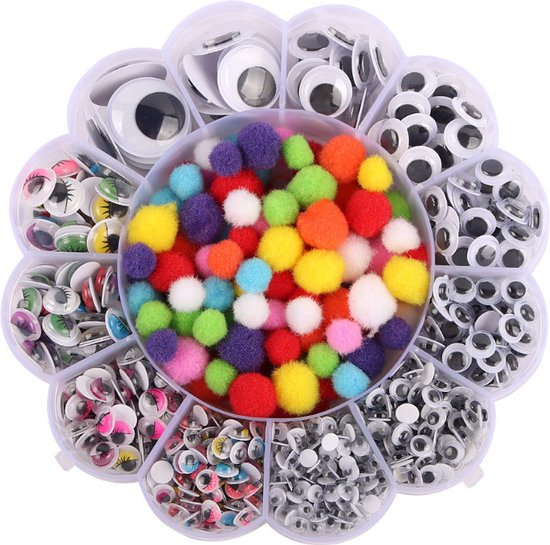 Un assortiment d'yeux mobiles et de pompons colorés dans un organisateur rond.