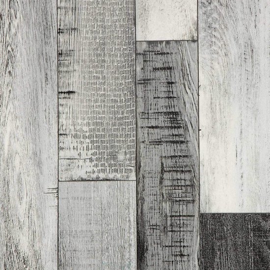 Gros plan d'un plancher en bois vieilli dans des tons gris, blanc et noir.