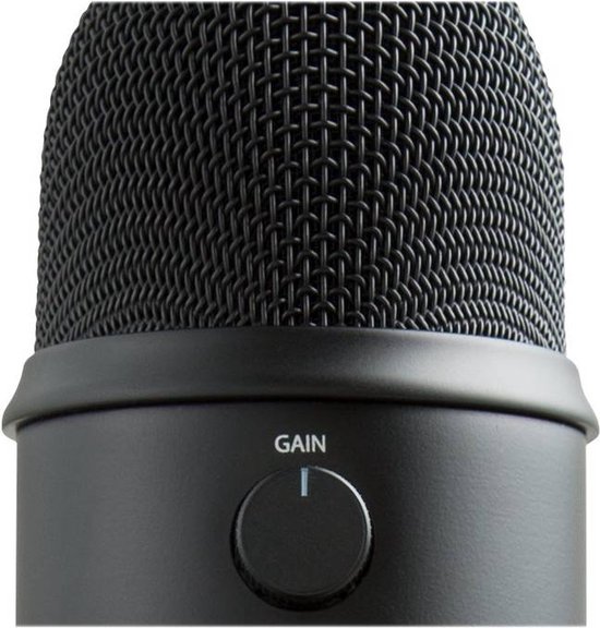 Gros plan sur le dessus d'un microphone noir avec molette de réglage "GAIN"