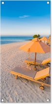 Tuinposter Caribisch strand met strandstoel - 40x80 cm - Wanddecoratie Buiten - Tuinposter - Tuindoek - Schuttingposter - Tuinschilderij