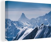 Canvas Schilderij Uitzicht over de Zwitserse bergen - 90x60 cm - Wanddecoratie