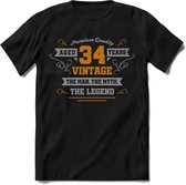 34 Jaar Legend T-Shirt | Goud - Zilver | Grappig Verjaardag Cadeau | Dames - Heren | - Zwart - L