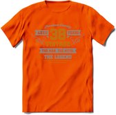 38 Jaar Legend T-Shirt | Goud - Zilver | Grappig Verjaardag Cadeau | Dames - Heren | - Oranje - M