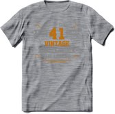 41 Jaar Legend T-Shirt | Goud - Zilver | Grappig Verjaardag Cadeau | Dames - Heren | - Donker Grijs - Gemaleerd - M