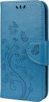 Mobigear Telefoonhoesje geschikt voor Apple iPhone 12 Hoesje | Mobigear Flowers Bookcase Portemonnee | Pasjeshouder voor 2 Pasjes | Telefoonhoesje voor Pinpas / OV Kaart / Rijbewijs - Blauw