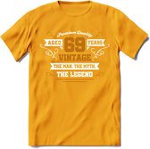 69 Jaar Legend T-Shirt | Goud - Wit | Grappig Verjaardag en Feest Cadeau Shirt | Dames - Heren - Unisex | Tshirt Kleding Kado | - Geel - 3XL