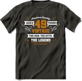 49 Jaar Legend T-Shirt | Goud - Wit | Grappig Verjaardag en Feest Cadeau Shirt | Dames - Heren - Unisex | Tshirt Kleding Kado | - Donker Grijs - S