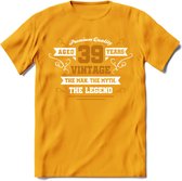 39 Jaar Legend T-Shirt | Goud - Wit | Grappig Verjaardag en Feest Cadeau Shirt | Dames - Heren - Unisex | Tshirt Kleding Kado | - Geel - XL