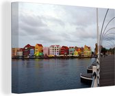 Canvas Schilderij Brug met uitzicht op de stad Willemstad, Curaçao - 90x60 cm - Wanddecoratie