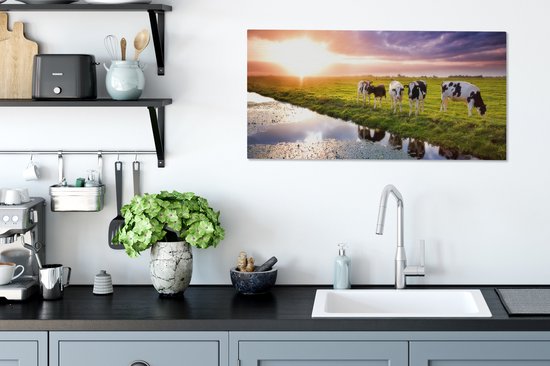 Tableau sur toile Vaches pendant un coucher de soleil - 80x40 cm - Décoration murale Art