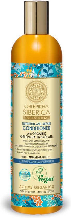 Gele fles met een label met blauwe, oranje en witte patronen. Bevat de tekst 'NUTRITION AND REPAIR CONDITIONER'.