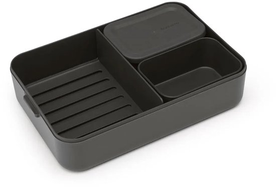 Donkergrijze bento lunchbox met scheidingswand, een groot vak en twee kleinere vakjes. Gemaakt van kunststof.